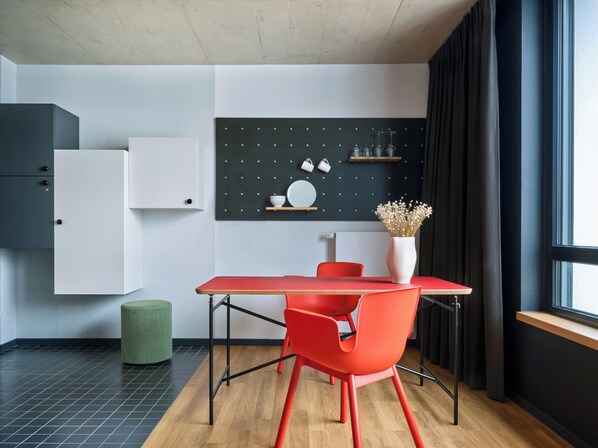 Design Studio, 1 King Bed | Living area | 30-inch flat-screen TV with cable channels - STAYERY Cologne Ehrenfeld (Cologne)
