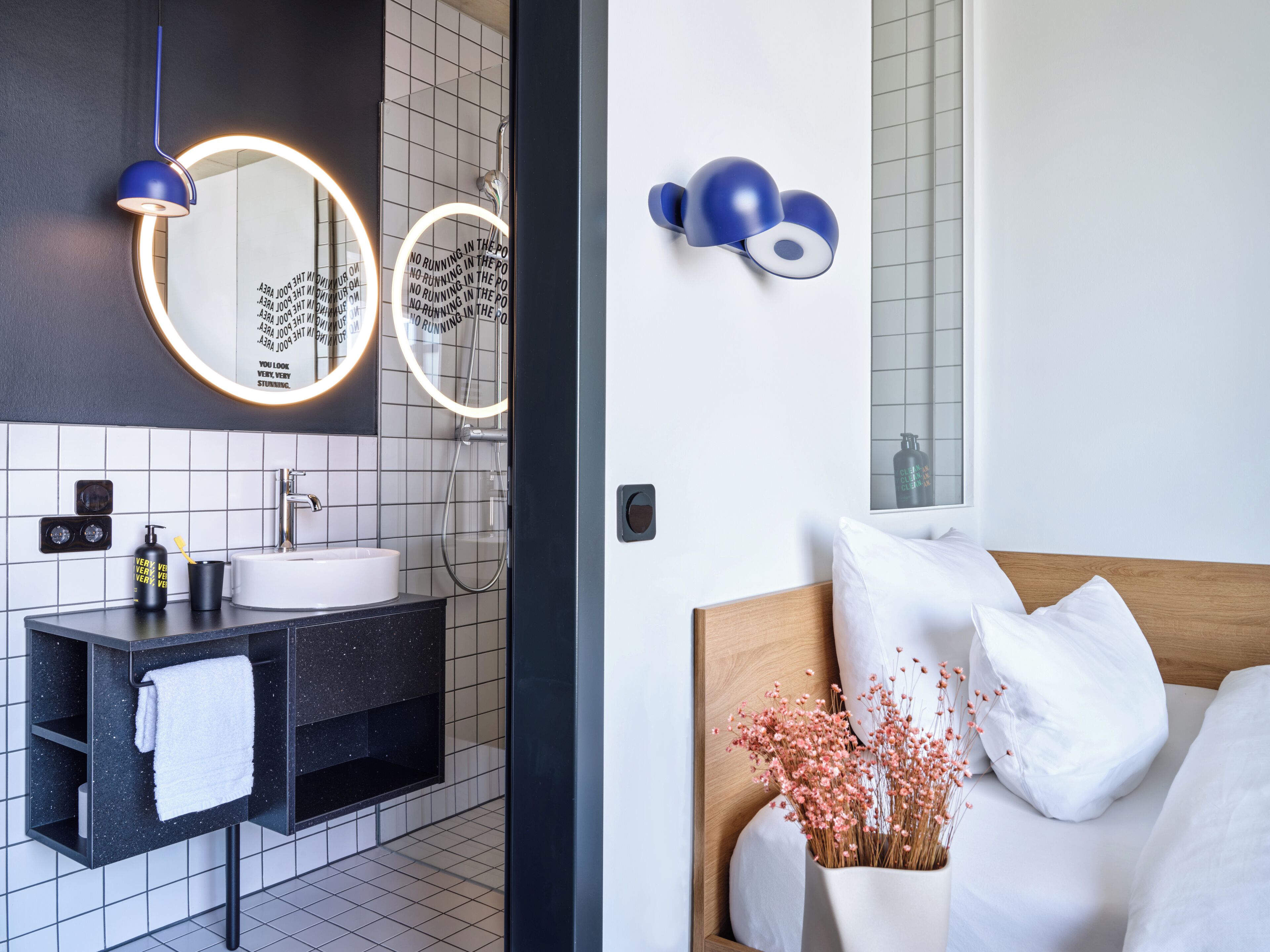 Studio | Premium bedding, desk, laptop workspace, blackout drapes