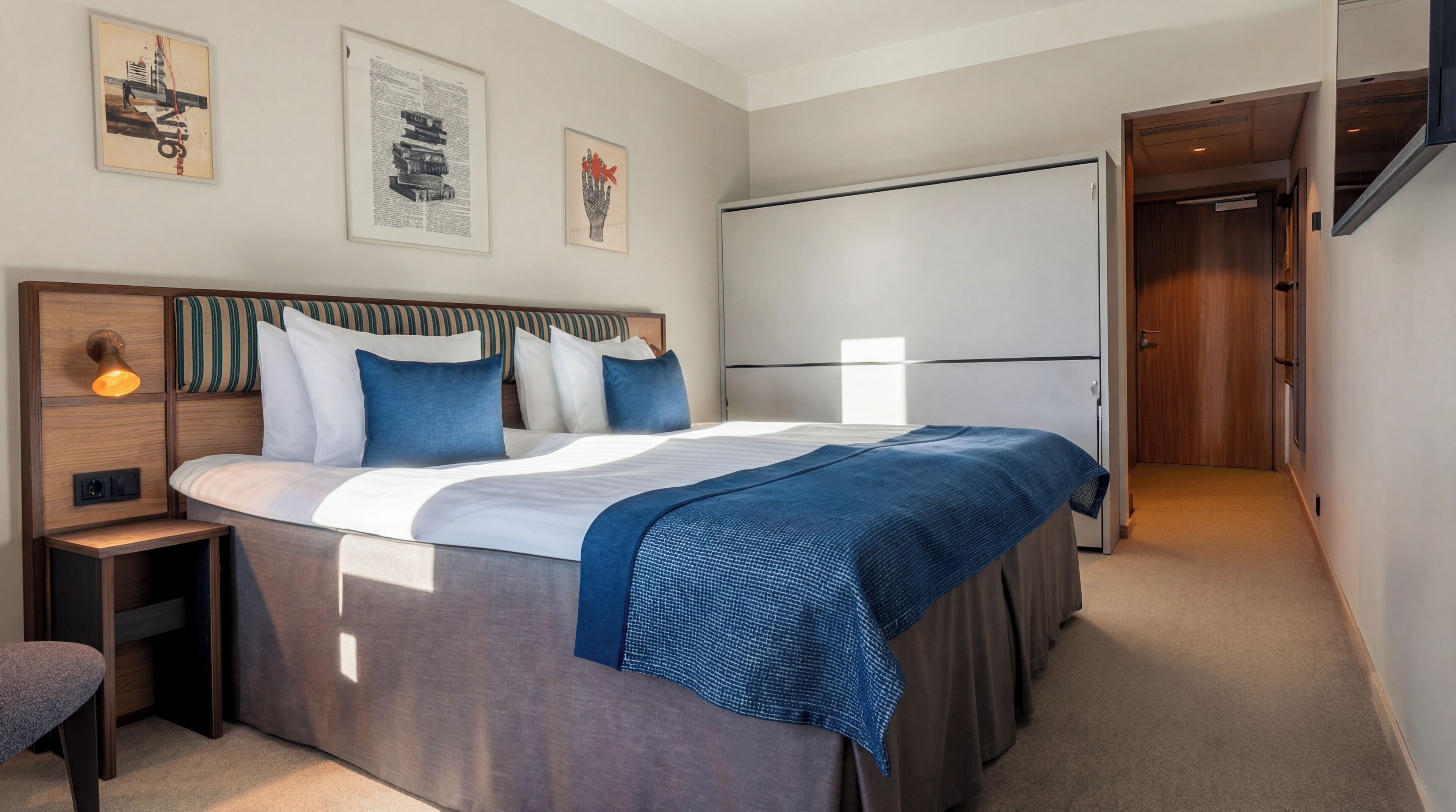 Hypo-allergenic bedding, desk, laptop workspace, blackout drapes