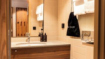 Shower, hair dryer, heated floors, towels