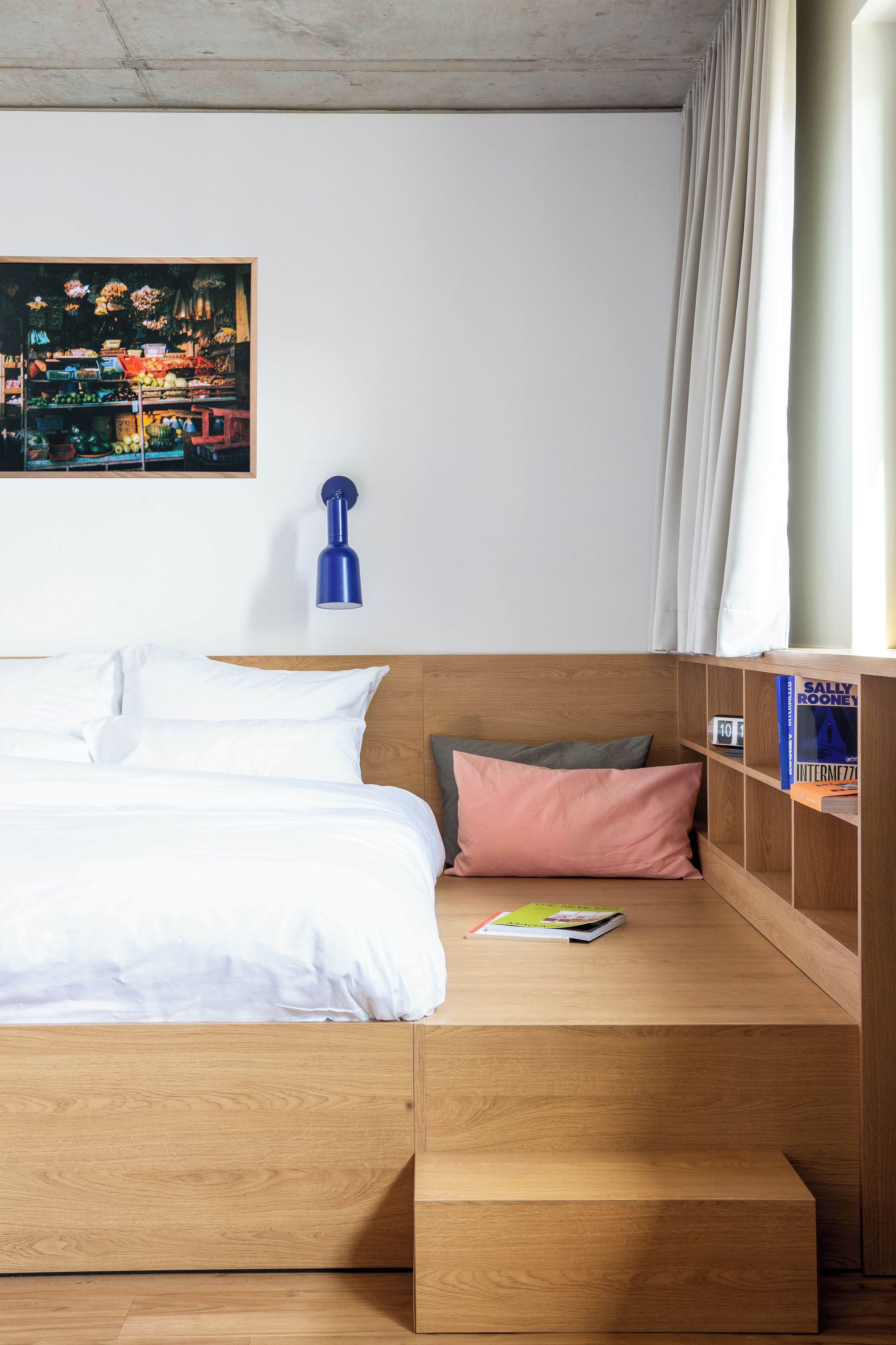 Premium bedding, desk, laptop workspace, soundproofing