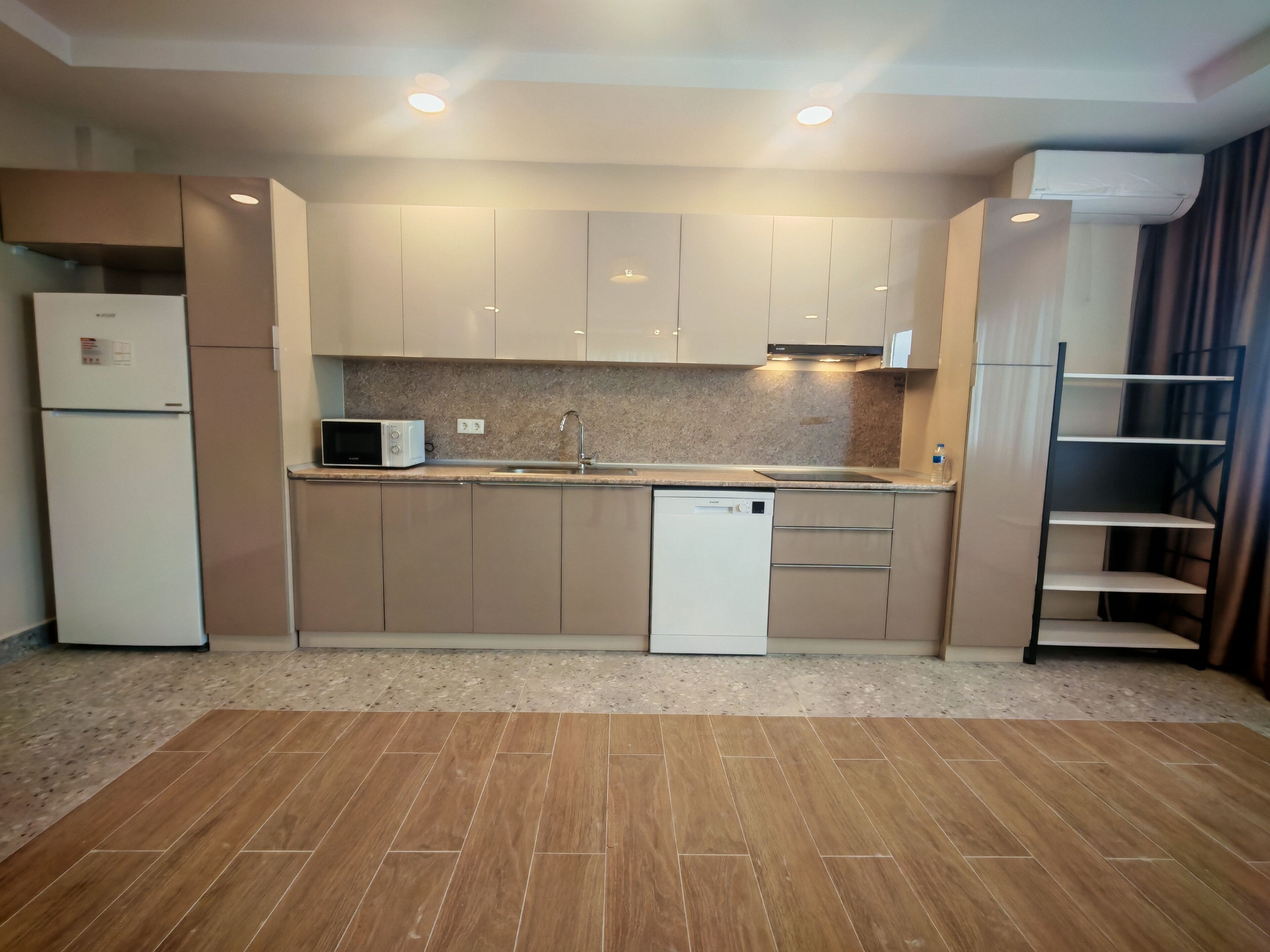 Comfort Apartment, Balcony | Private kitchen | Full-sized fridge, microwave, stovetop, cookware/dishes/utensils