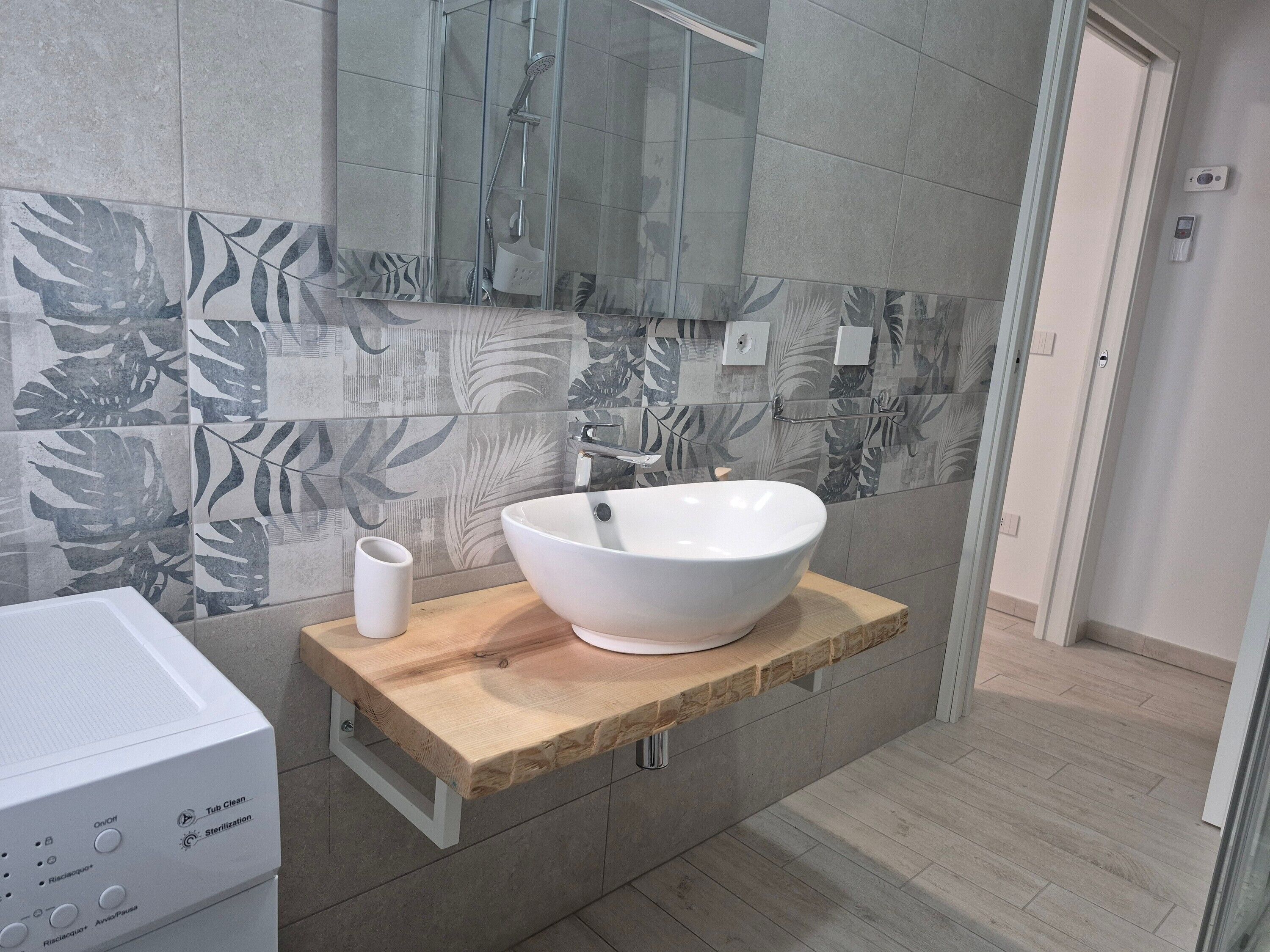 Doccia, asciugacapelli, asciugamani