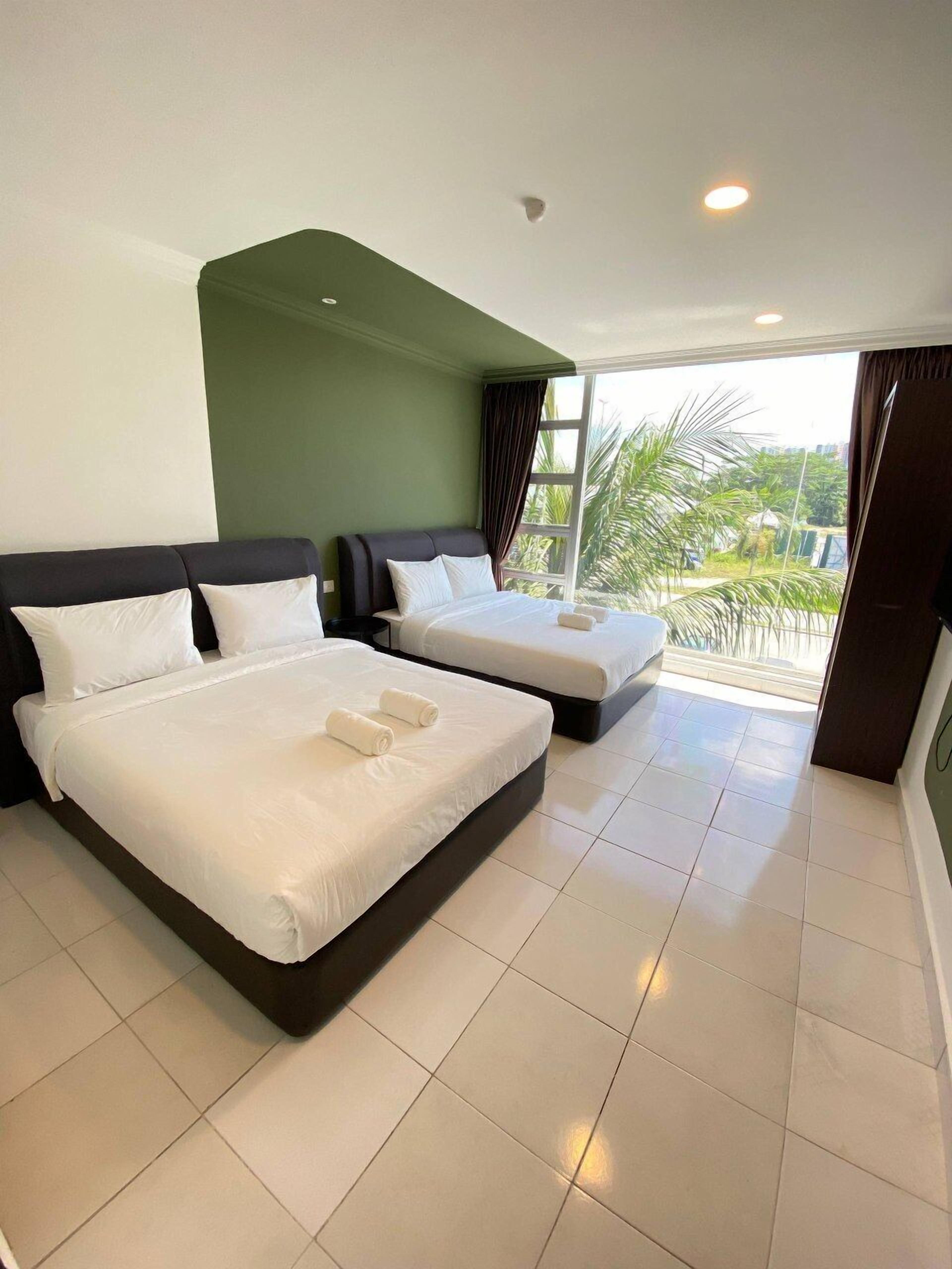 Kamar Quadruple Keluarga, Bebas Asap Rokok, kamar mandi pribadi | Meja kerja, Wi-Fi gratis, dan seprai linen