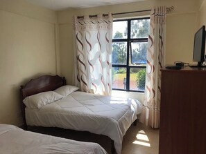 Quarto duplo luxo | Wi-Fi de cortesia, roupa de cama