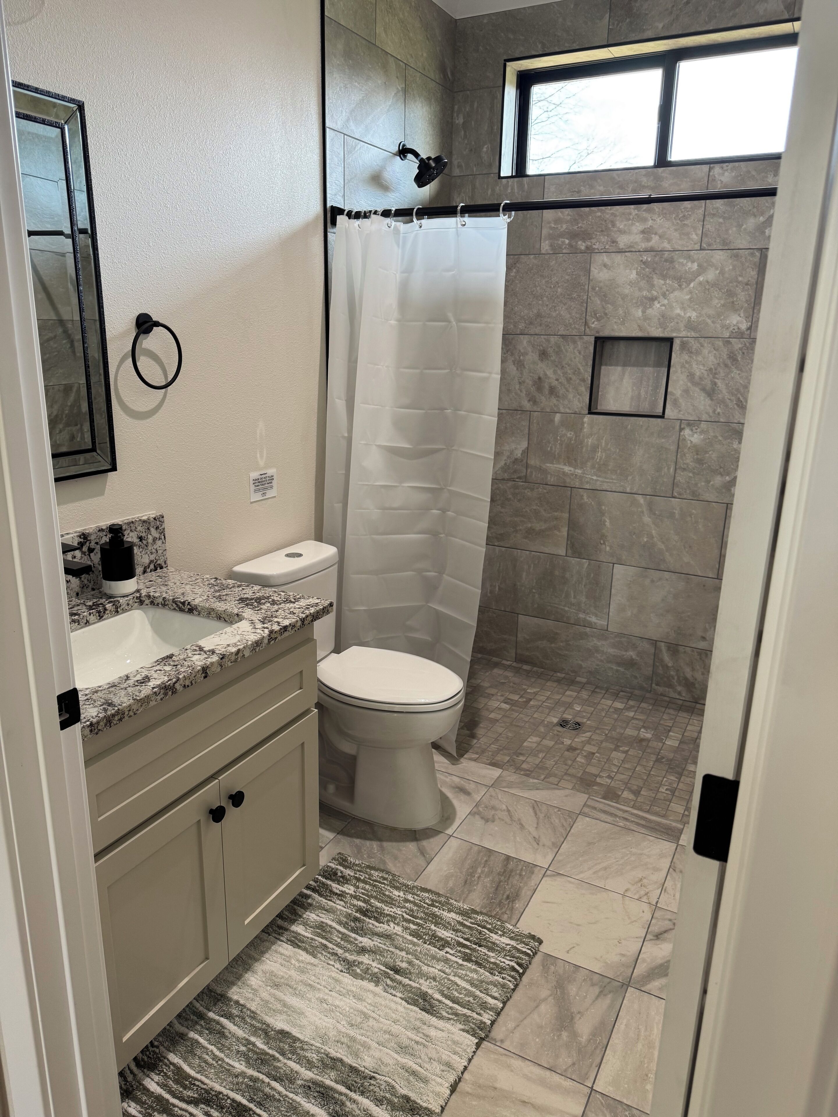 Shower, towels, soap, toilet paper