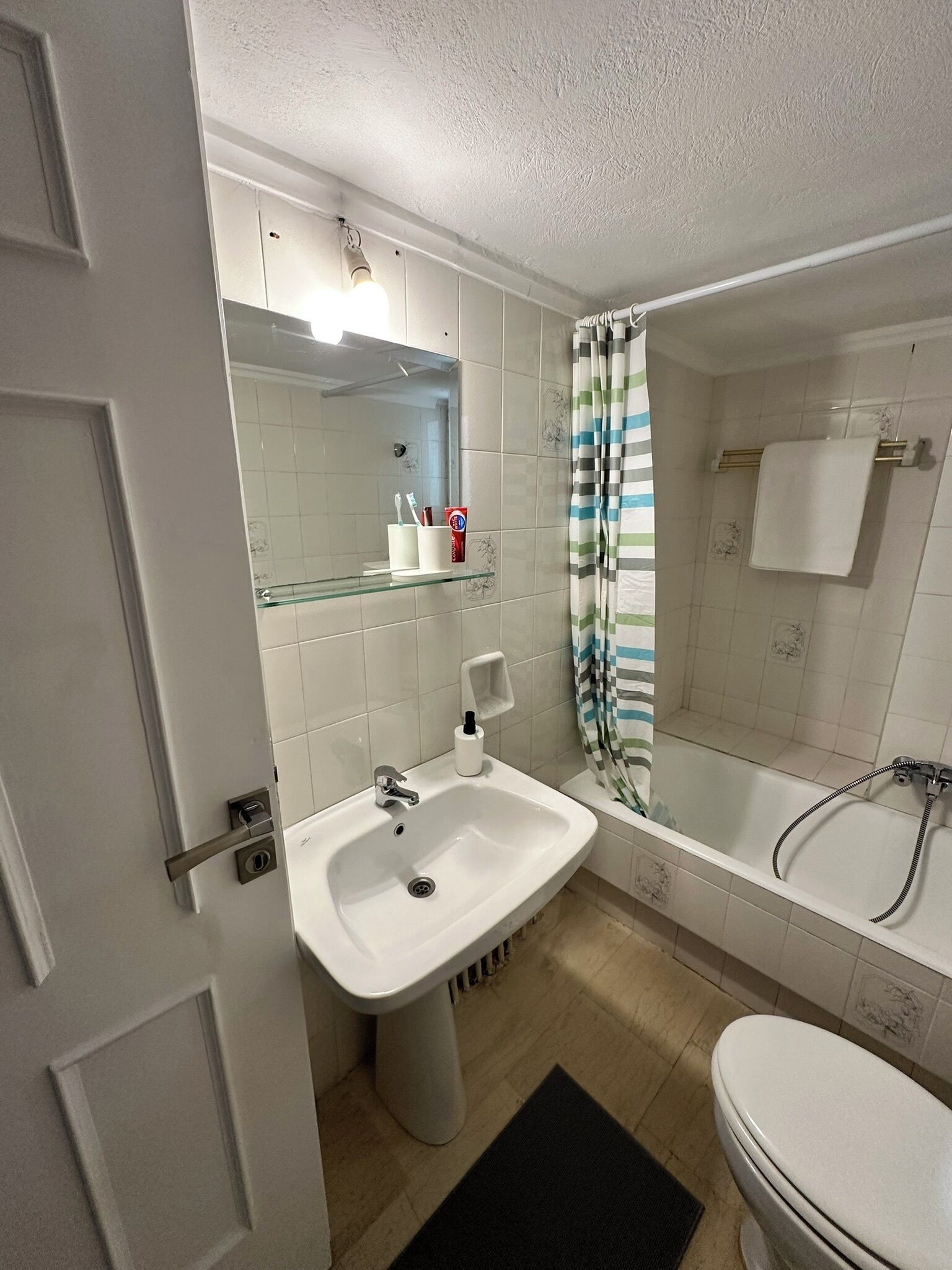 Hair dryer, towels, soap, toilet paper