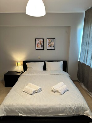 2 dormitorios, tabla de planchar con plancha, wifi gratis y ropa de cama