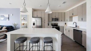 Fridge, dining tables - Landing | Spectacular 2BD, Gym, Pool (Perdido Key)