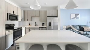 Fridge, dining tables - Landing | Chic 1BD, Gym, Clubhouse (Perdido Key)