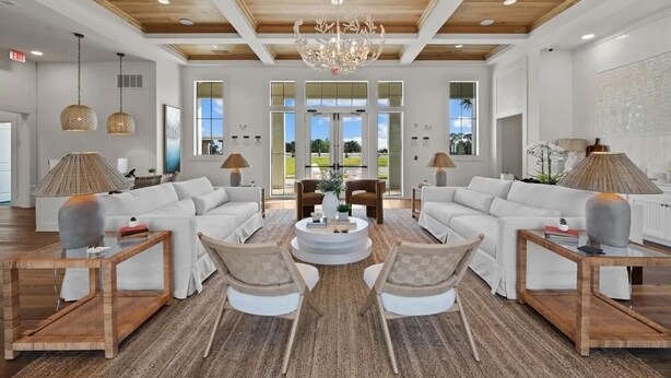 A spacious living room with a high ceiling, large windows, and a chandelier. - Landing | Amazing 1BD, Gym, Clubhouse (Perdido Key)