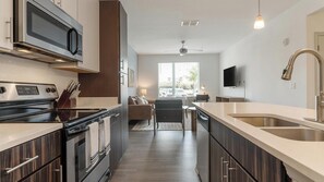 Fridge, dining tables - Landing | Chic 1BD, Clubhouse, Gym (Lockhart)