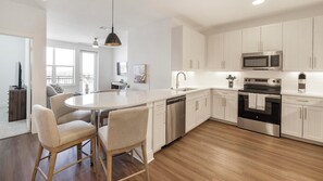 Fridge, dining tables - Landing | Incredible 2BD in Downtown Roanoke (Fort Worth)