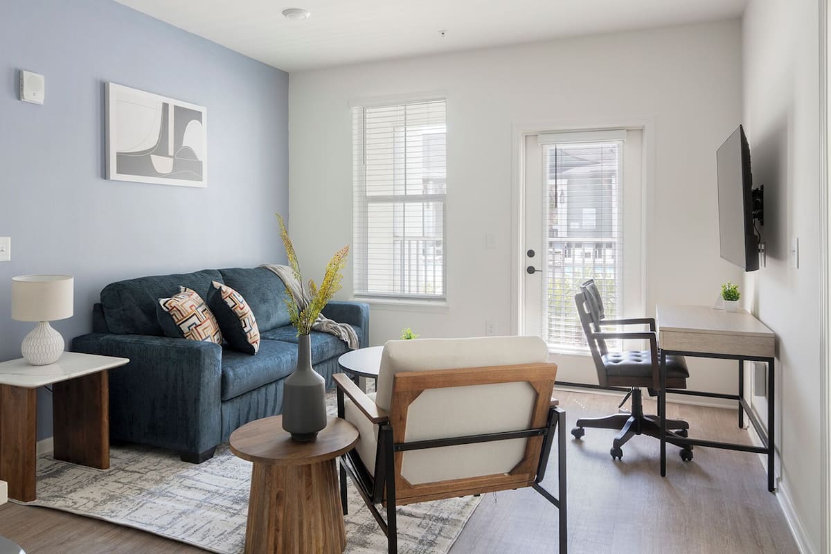 Apartment (2 Bedrooms) | Living area | 50-inch Smart TV with digital channels