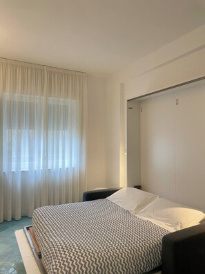 Estúdio | Quartos à prova de som, ferros/tábuas de passar roupa, Wi-Fi de cortesia