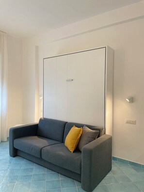 Estúdio | Área de estar | TV de tela plana