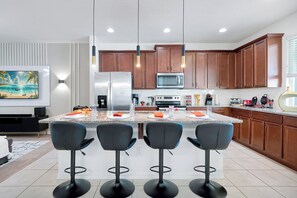 Fridge, microwave, oven, stovetop - Spacious Solara Resort Home w/ Private Pool • Near Disney • Sleeps 12 (Kissimmee)