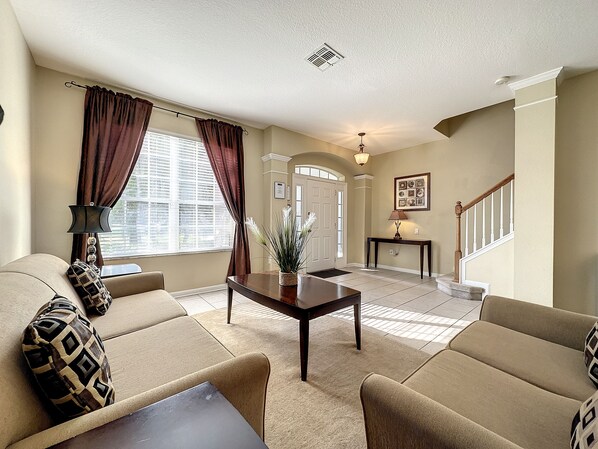 Living area - This amazing 6 Bedroom property with a lake view is spacious and newly furnished (Kissimmee)