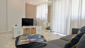 Studio, Sea View | Living area | TV