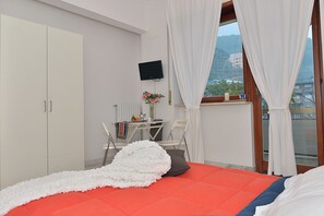 Condo, Balcony, Partial Sea View | Iron/ironing board, free WiFi