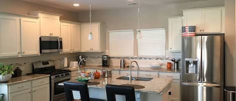 Fridge, microwave, dishwasher, coffee/tea maker