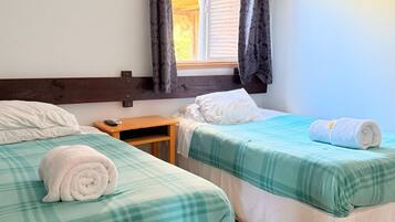 Chambre Économique Double ou avec lits jumeaux, vue jardin | Wi-Fi gratuit