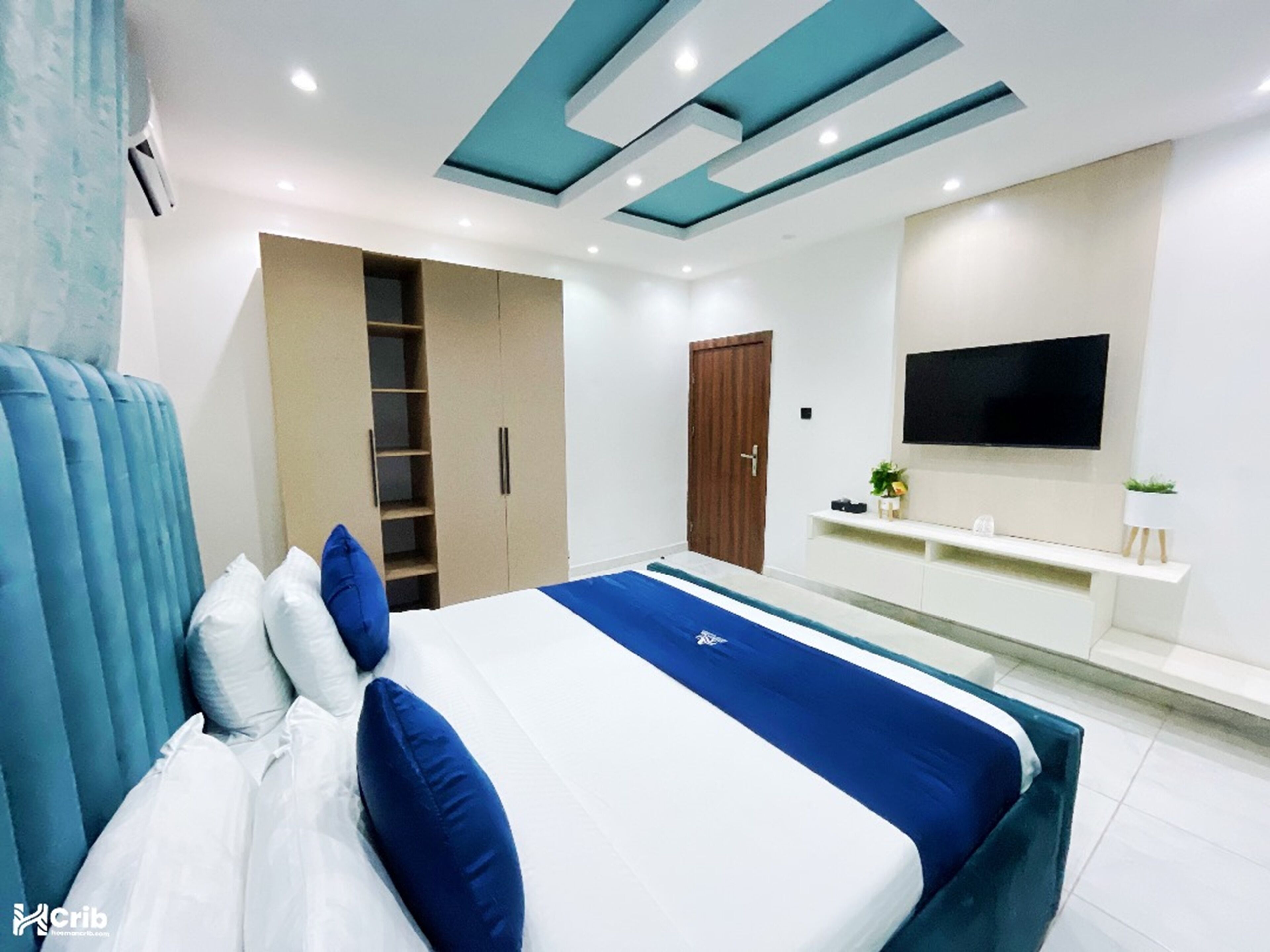 Leilighet – deluxe, balkong, byutsikt | Skrivebord, skrivebord for bærbar PC og blendingsgardiner