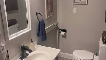Hair dryer, towels, soap, toilet paper