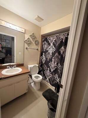 Hair dryer, towels, soap, toilet paper