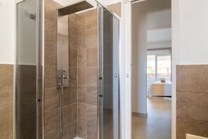 Hair dryer, bidet, towels, soap