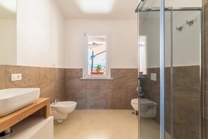 Hair dryer, bidet, towels, soap