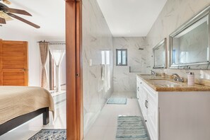Shower, hair dryer, towels, soap