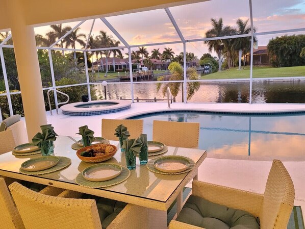 Outdoor pool, a heated pool - Dazzling Waterfront Home with Hot Tub and Pool! (Cape Coral)