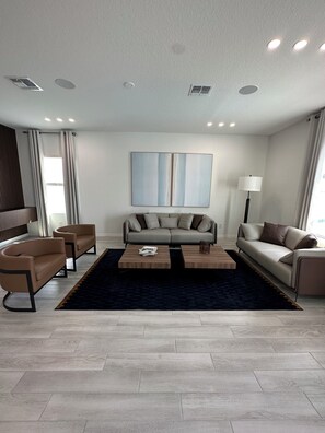 Living area - Disney World 15min! Private Pool 4 Bedroom Themed House! (Davenport)