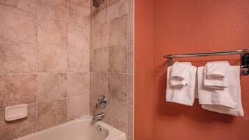 Shower, hair dryer, towels, toilet paper