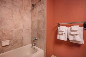 Shower, hair dryer, towels, toilet paper
