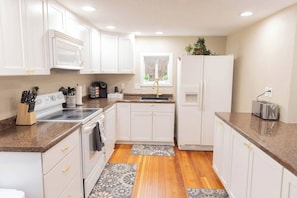 Fridge, microwave, oven, stovetop - Delightful Four Bedroom Home near Downtown (Wabasha)