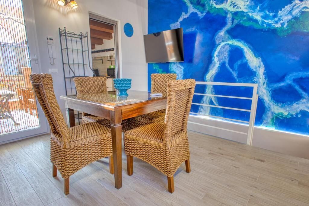Design Apartment, 2 Bedrooms, Kitchen, Partial Sea View | Dining