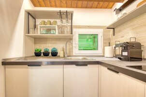 Design Apartment, 2 Bedrooms, Kitchen, Partial Sea View | Private kitchen | Fridge, microwave, stovetop, espresso maker