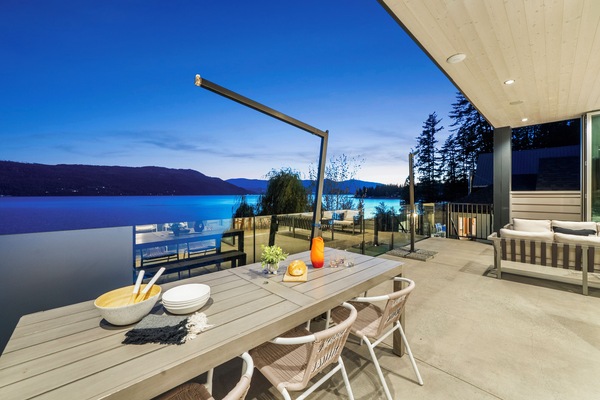 Main floor concrete deck. dining for 6 plus lounge area. Copper Island views.