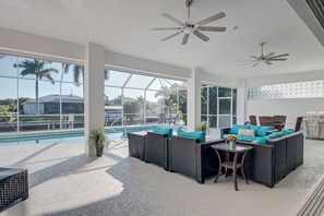 Terrace/patio - Tropical Oasis 4-bedroom CANAL- HEATED POOL home with dock in SW Cape Coral (Cape Coral)
