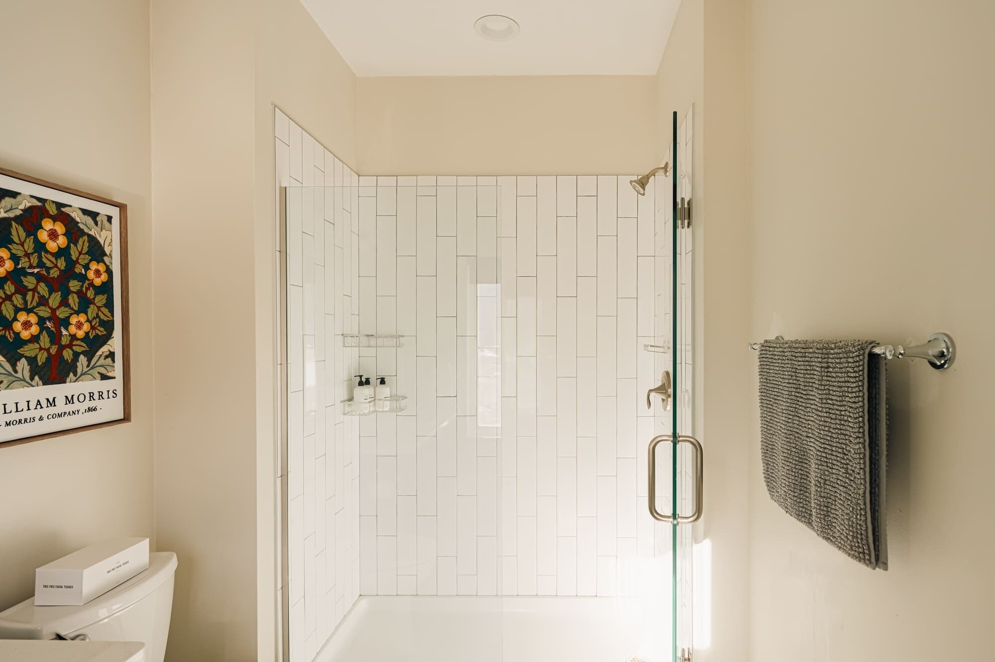 Shower, hair dryer, towels, shampoo