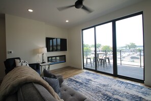 TV, fireplace - Located centrally in the middle of Okoboji Iowa, 3 story townhome (Arnolds Park)