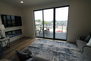 TV, fireplace - Located centrally in the middle of Okoboji Iowa, 3 story townhome (Arnolds Park)