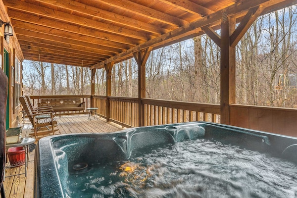 Unwind in the private on-deck hot tub while enjoying the fresh mountain air.