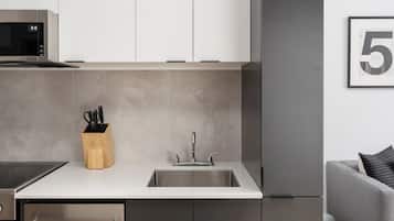 Exclusive Apartment | Living area | 65-inch Smart TV with digital channels, Netflix, Hulu