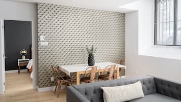 Design Apartment | Living area | 65-inch Smart TV with digital channels, Netflix, Hulu