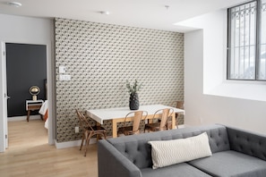 Design Apartment | Living area | 65-inch Smart TV with digital channels, Netflix, Hulu - The Alexander Hotel - Old Montreal (Montréal)