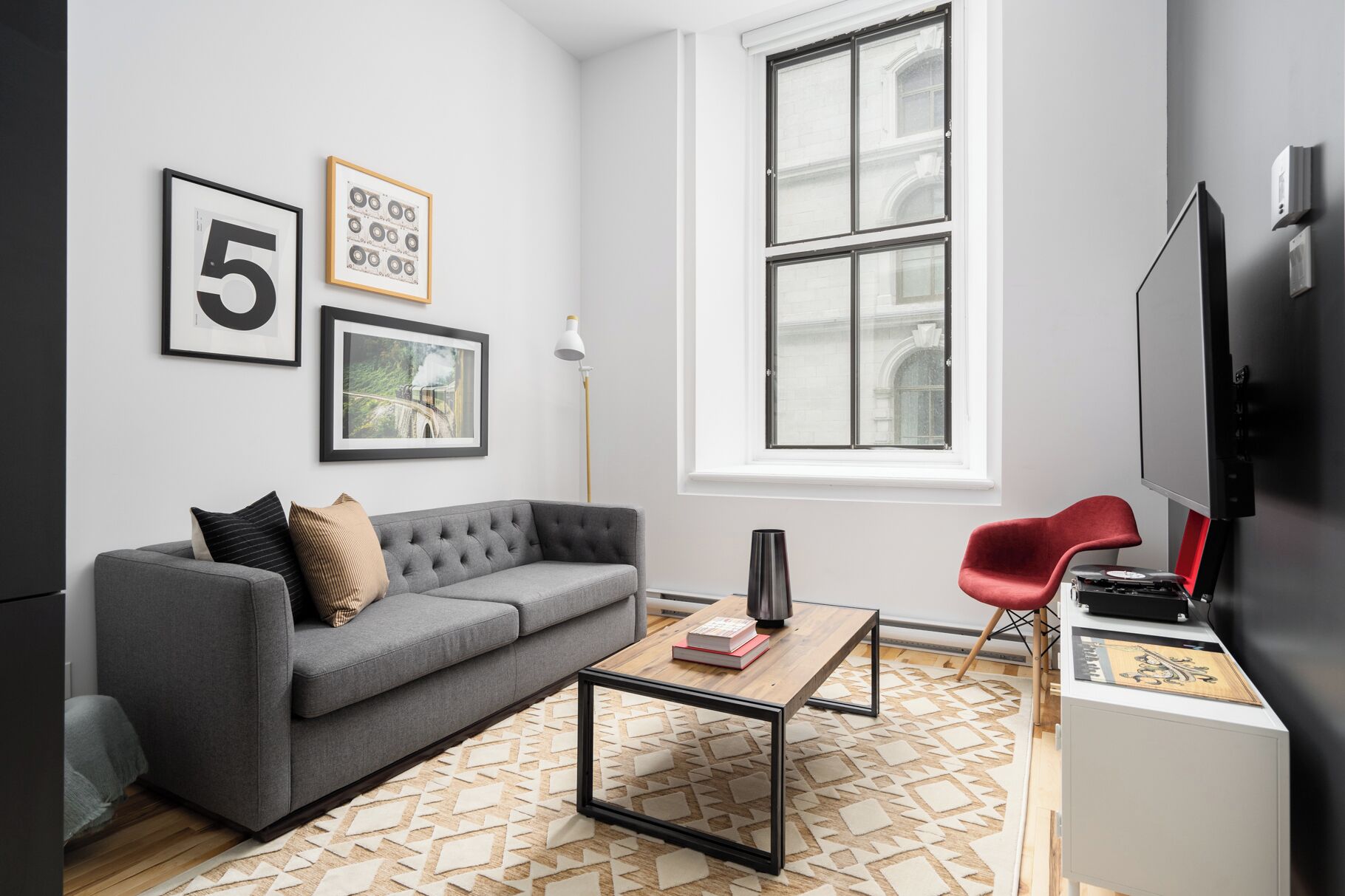 Exclusive Apartment | Living area | 65-inch Smart TV with digital channels, Netflix, Hulu