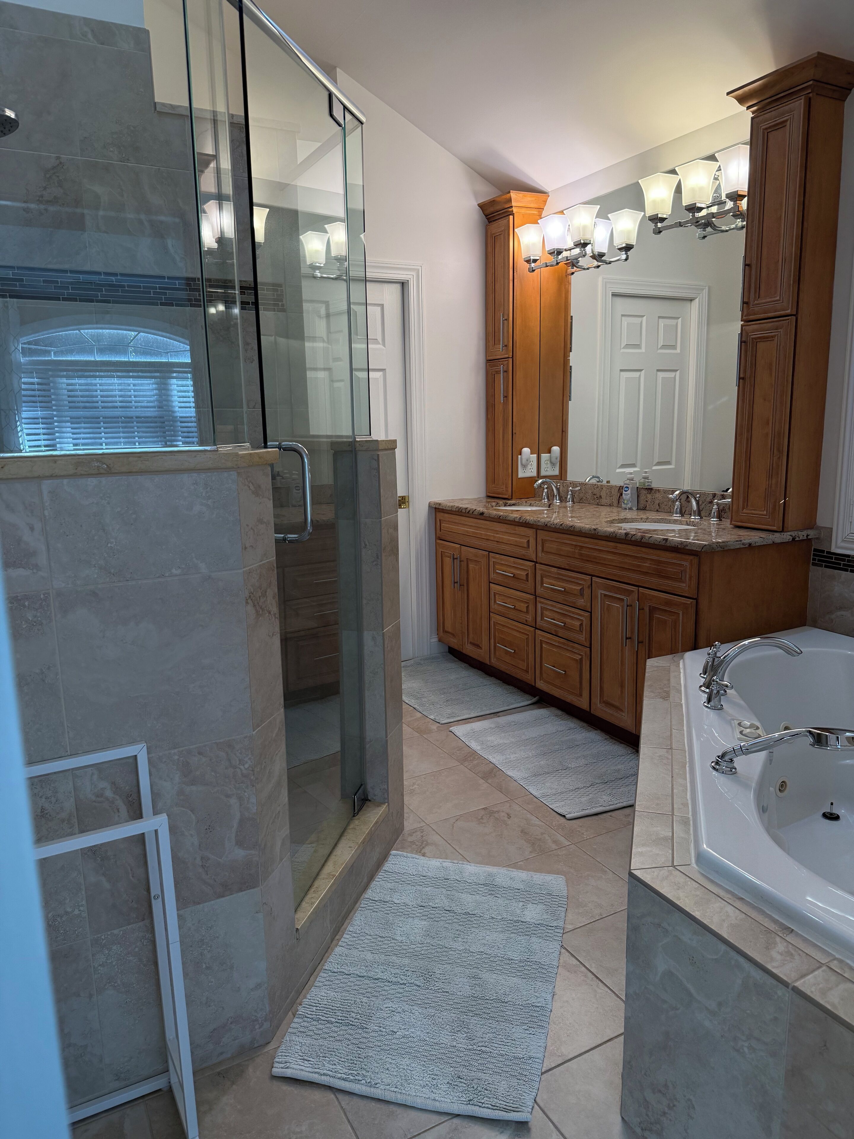 Jetted bath, hair dryer, towels, soap
